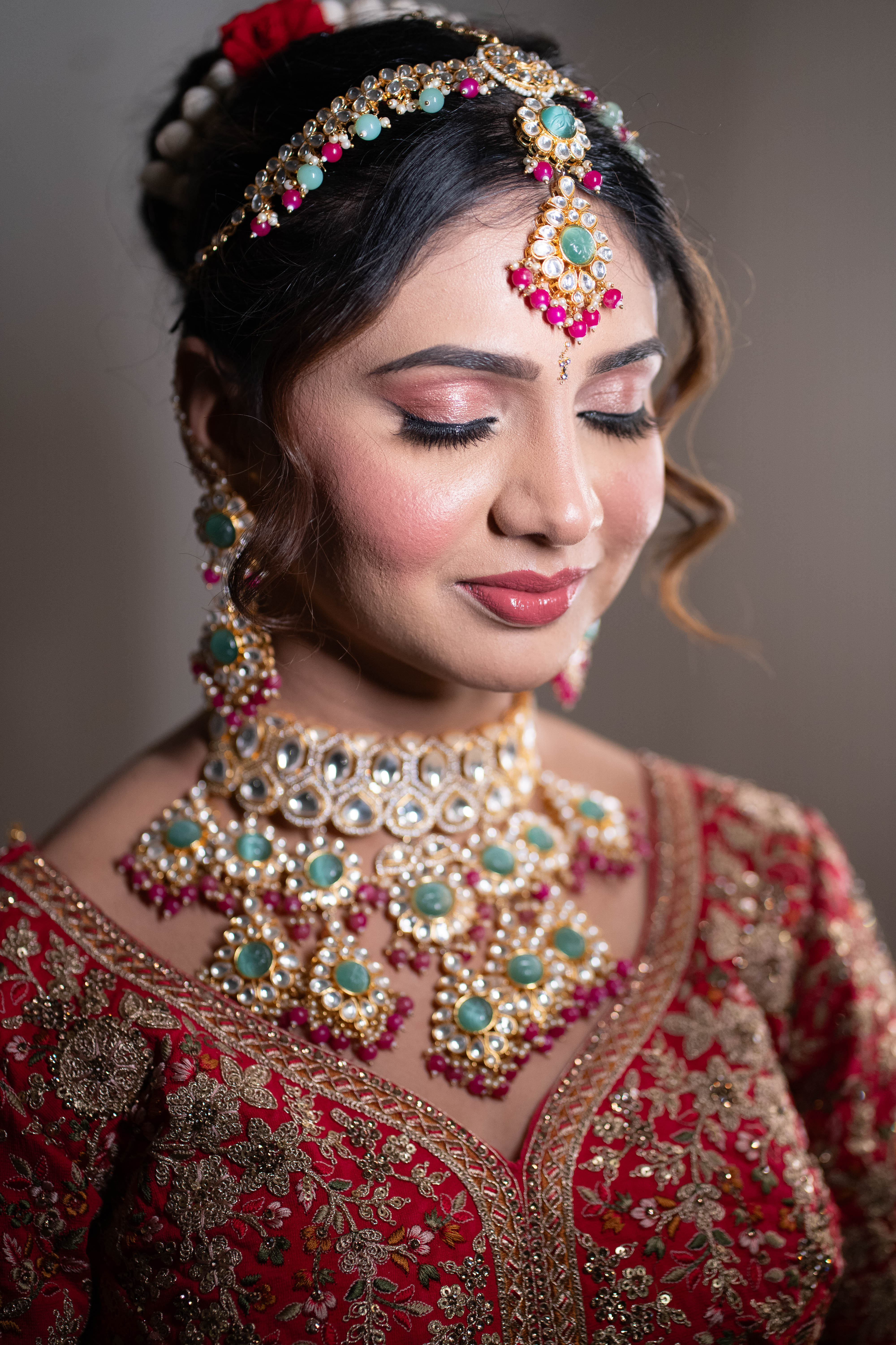 Serene bridal portrait with intricate jewelry